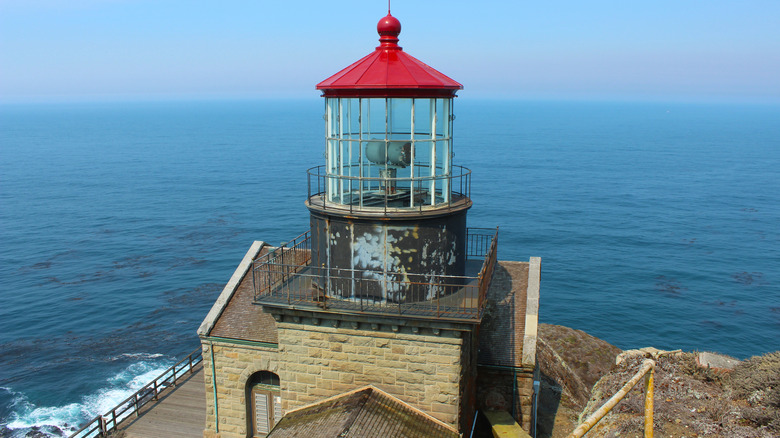 A lighthouses overlooks the Big Sur Coast at Point Sur State Historical Park.