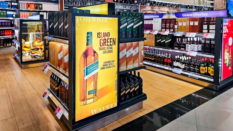 Duty-free alcohol for sale at an airport shop in Barcelona