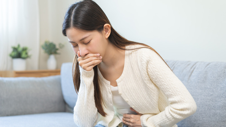 Woman with an upset stomach