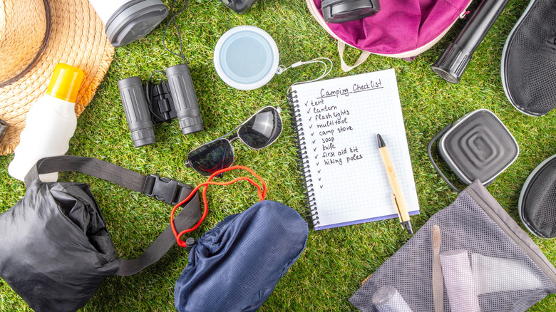 Camping checklist with various camp equipment