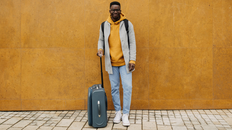 A light-packing traveler with one piece of luggage.