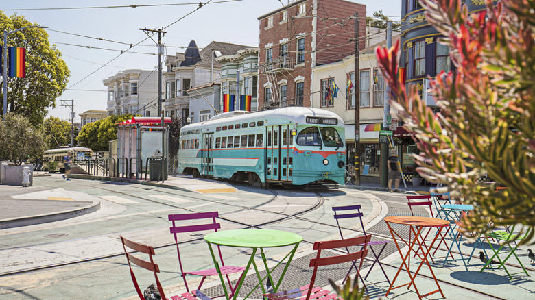Castro Streetcar with Rainbow Flags in the streets of San Francisco