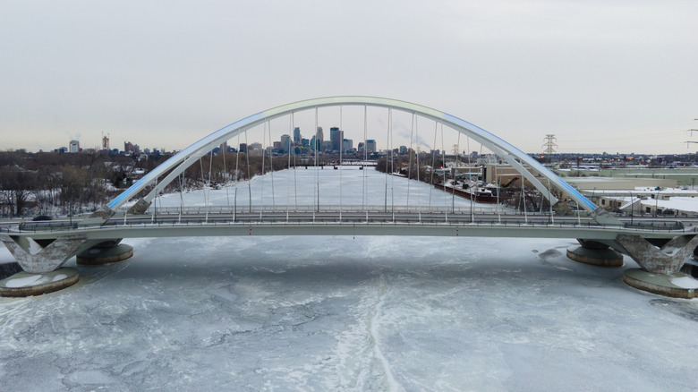 Frozen Mississippi River and bridge in Minneapolis