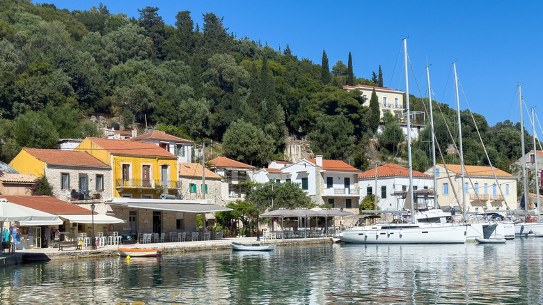 Harborside with bright houses lined along the coastline