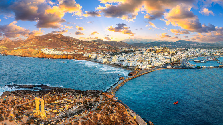 Aerial view of Greek island, two ends connected by a path, ancient Apollo temple gate on one side