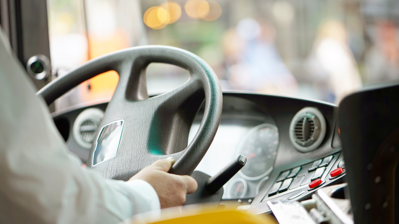 Close-up of bus driver
