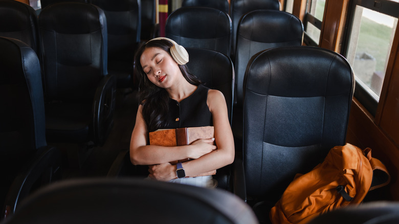 Person on bus with headphones