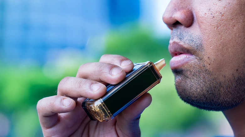 Person smoking a vape
