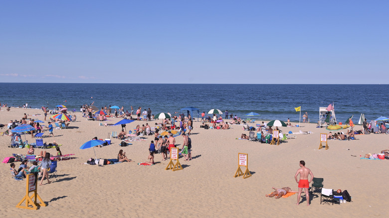 People enjoying the beach in Long Branch