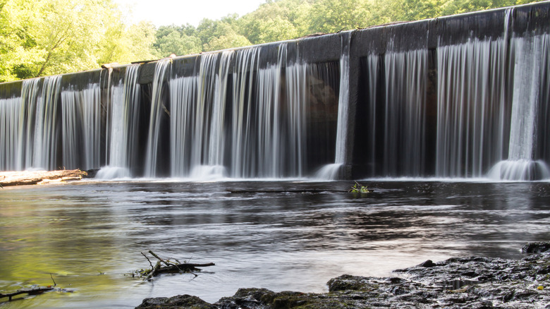 Water going over a dam at Old Stone Fort State Archaeological Park in Manchester, Tennessee
