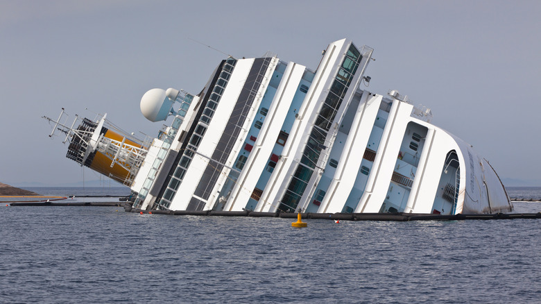 Half-submerged Costa Concordia sinking in the ocean off the coast of Italy in 2012