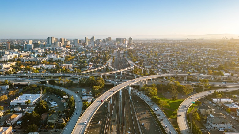 Aerial view over interchanges in Oakland, California at sunset