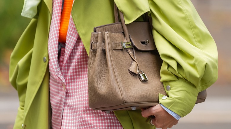 Someone carrying a Birkin bag