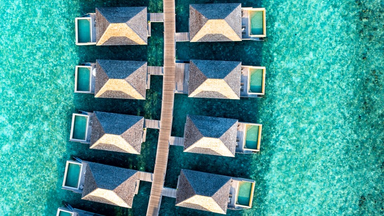 Overwater bungalows at the Hurawalhi Island resort