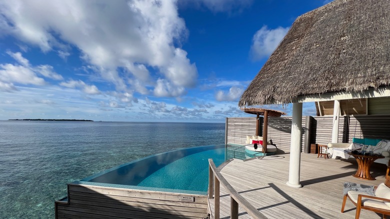 The infinity pool of an ocean overwater villa at the Milaidhoo island resort