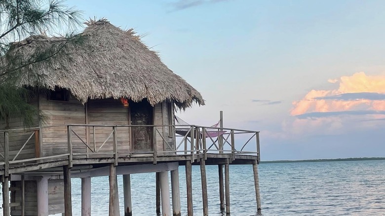 An overwater bungalow in Thatch Caye, Belize