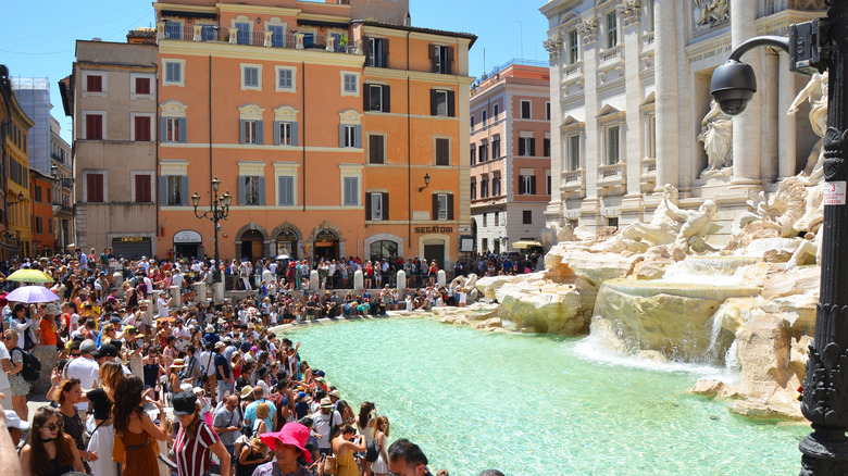 Crowds at the Trevi Fountain in Rome, Italy