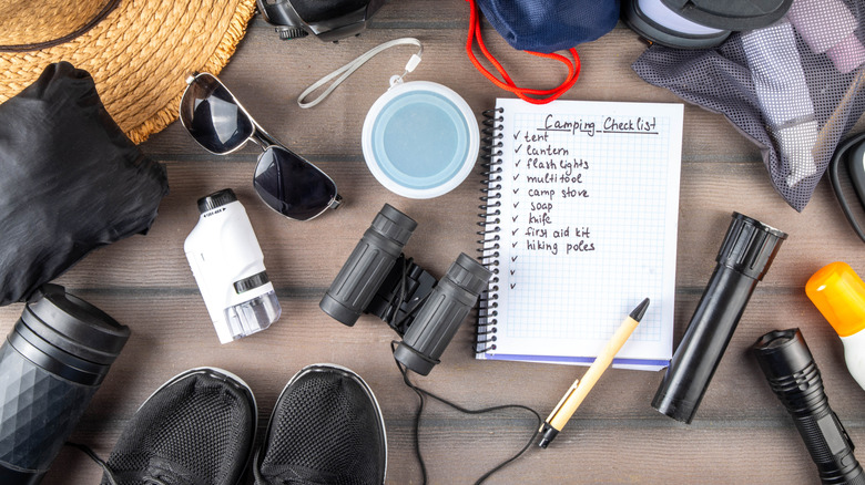 Camping checklist with various camp equipment