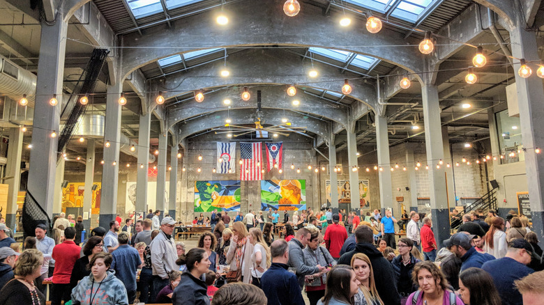 People inside Rhinegeist Brewery in Cincinnati