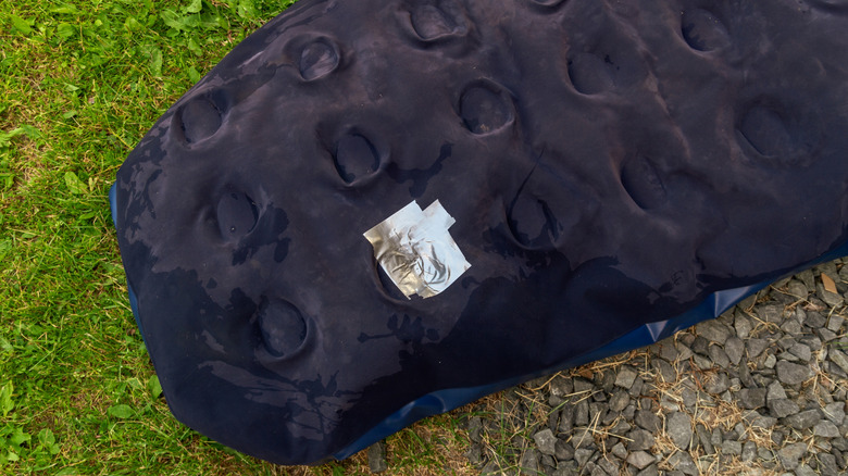 Duct tape on a camping air mattress