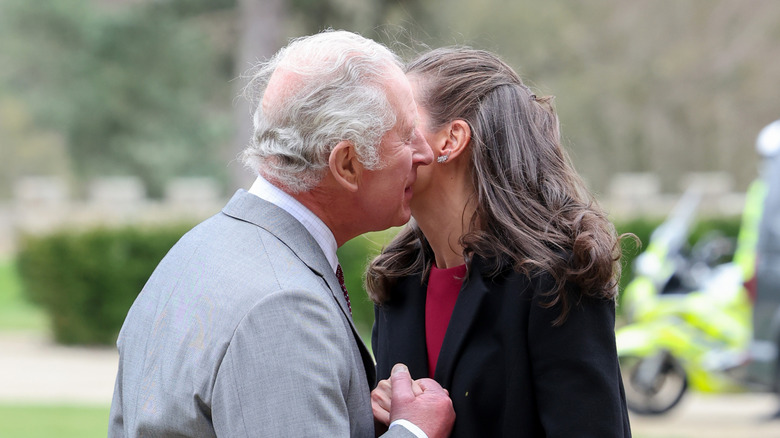 Prince Charles and Queen letizia cheek kiss