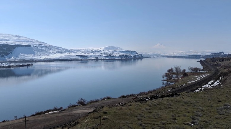 A snow-covered cluff in the Columbia River Gorge looking toward Mount Hood from Avery Recreation Area