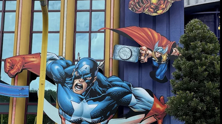 View of oversized Captain America and Marvel super hero artwork on the exterior of Captain America Diner at Islands of Adventure.