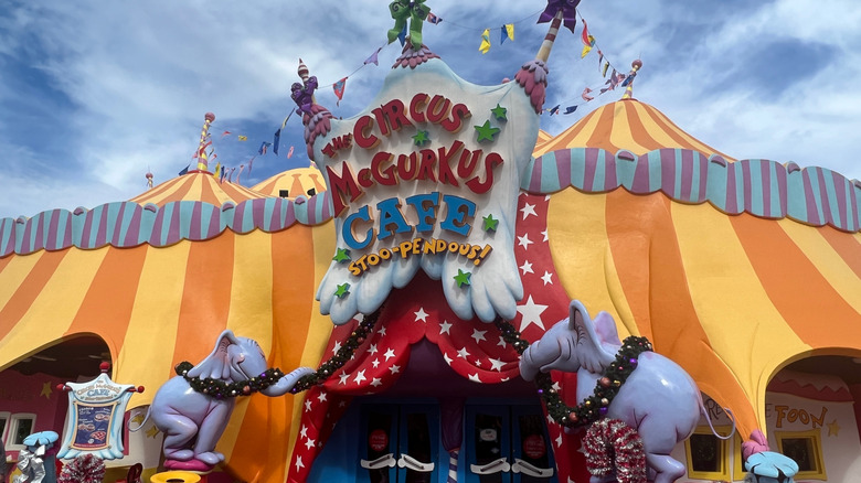 Exterior view of entry to Circus McGurkus Cafe Stoo-Pendous at Universal Islands of Adventure with circus-themed big top signage