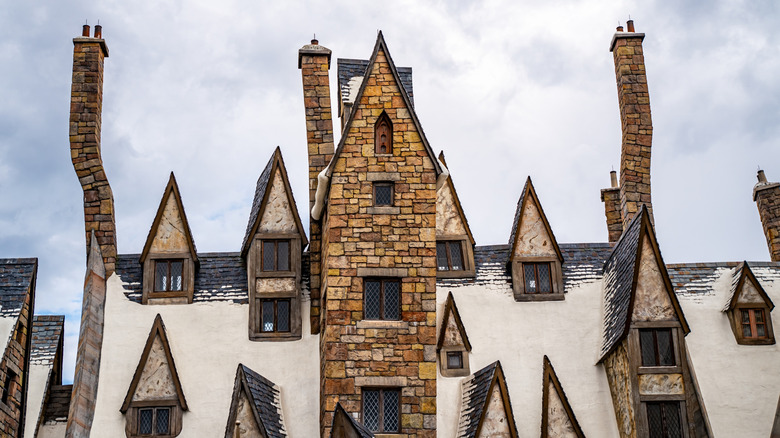 Snow-covered roofline of the The Three Broomsticks Restaurant in Hogsmeade, Universal Studios Florida.