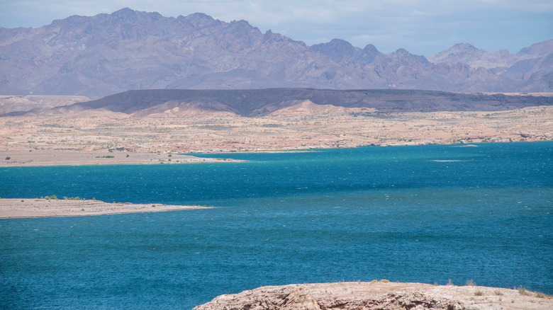 View of Lake Mead on a sunny day with mountains in the background