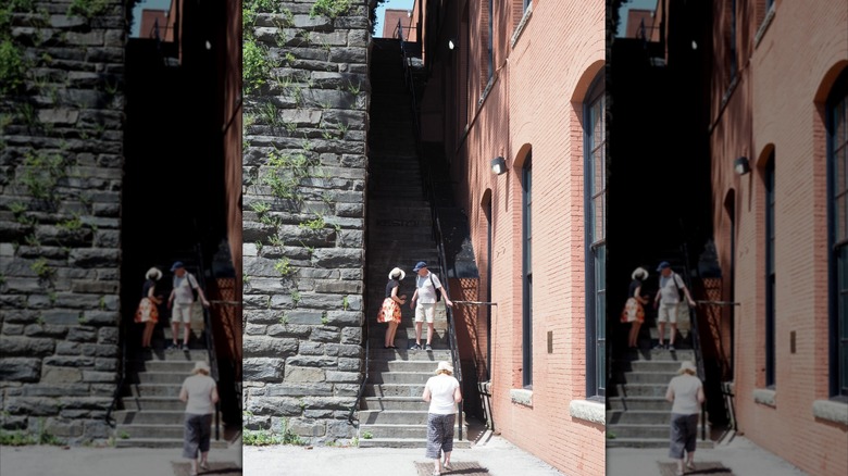 Tourists walking on stairs