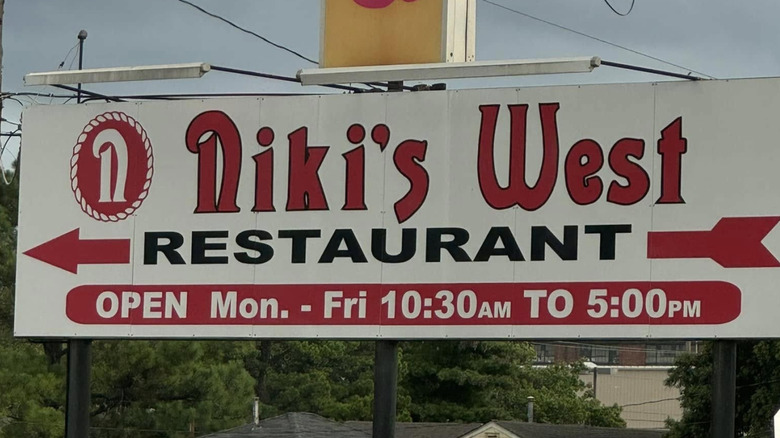 The red and white sign outside Niki's West