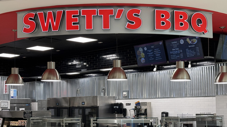 The red sign above the steam table at Swett's