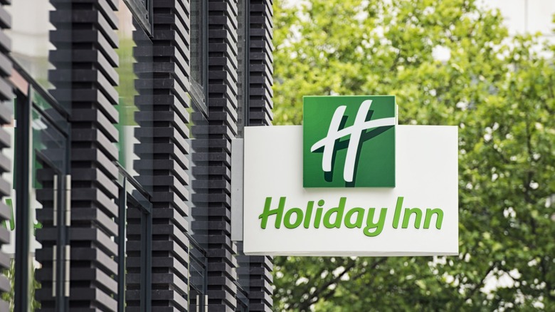 A Holiday Inn sign outside the hotel