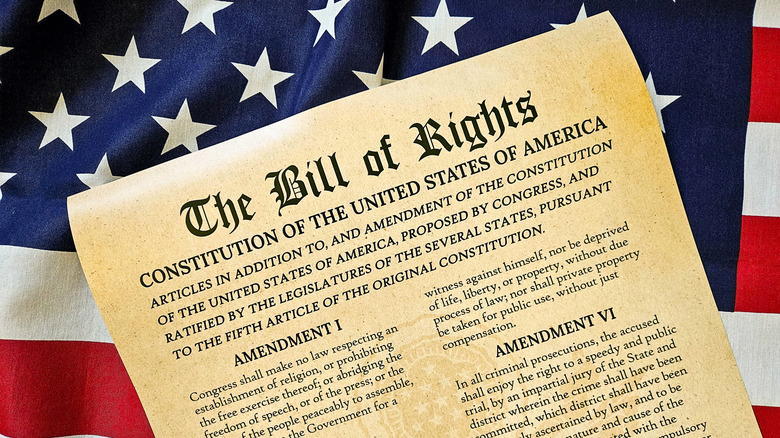 Bill of Rights with US flag in background