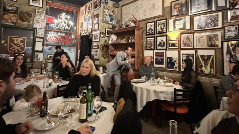 People eating inside Emilio's Ballato