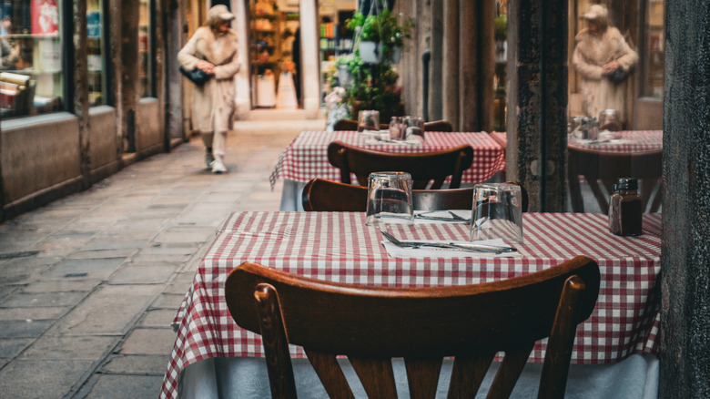 Outdoor checkered tablecloth on restaurant table