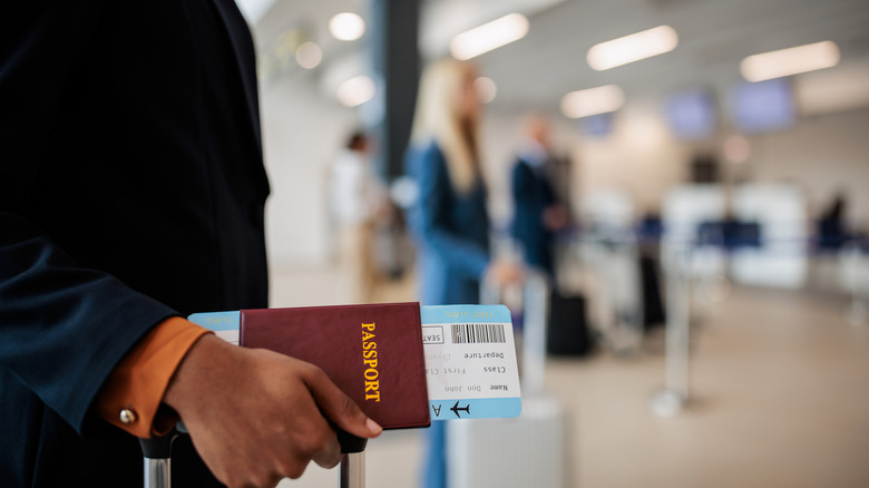Person with passport at airport
