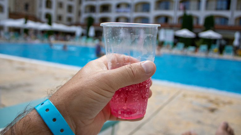 An all-inclusive guest wearing a wristband