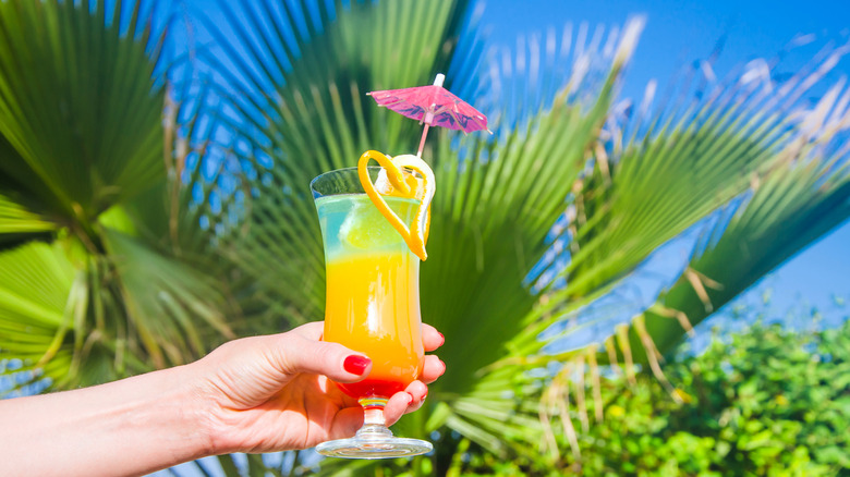 Woman holding a cocktail