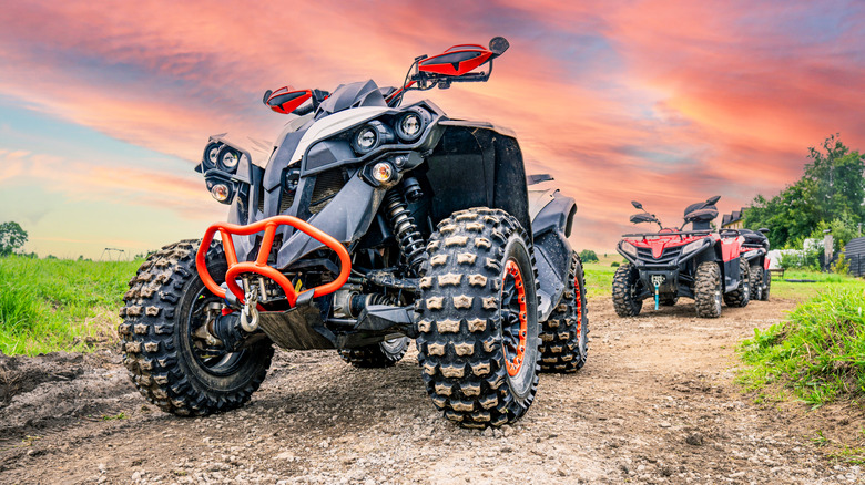 A couple of quad ATVs