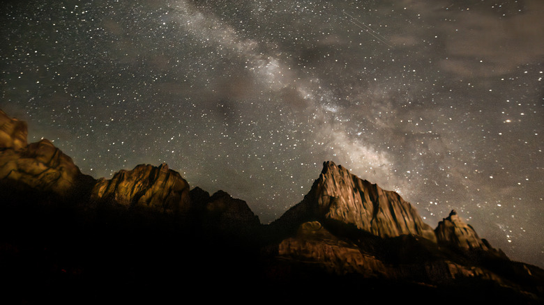 The Milky Way appears over The Watchman at Zion National Park, Utah