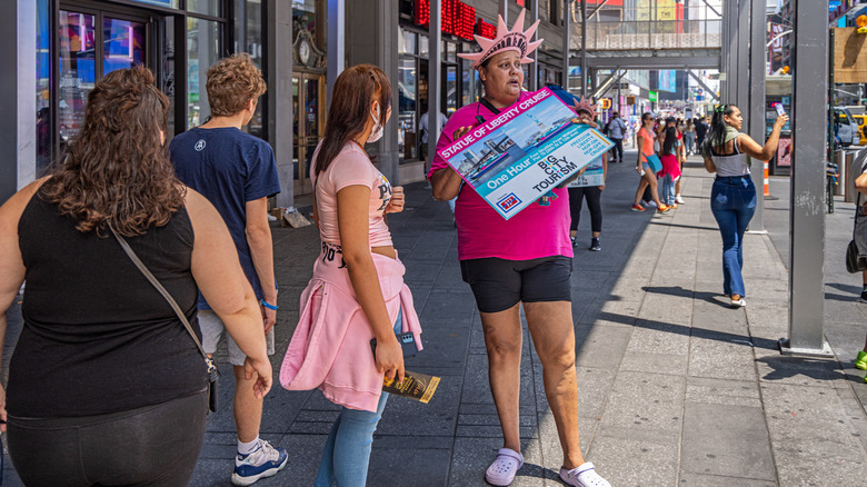 Woman selling New York tours