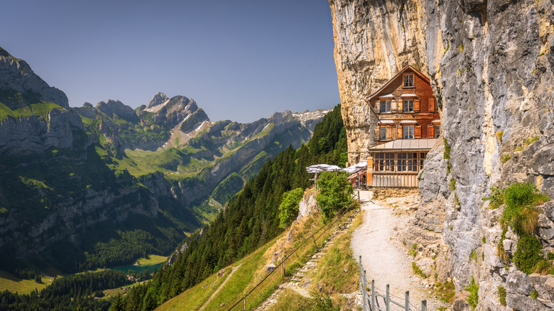 A mountainside restaurant beside a cliff in Switzerland