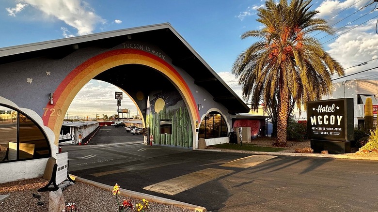 The exterior arch and office of retro, artsy Hotel McCoy in Tucson