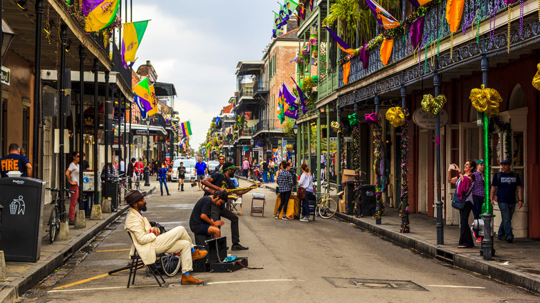 Street musicians play in New Orleans' French Quarter