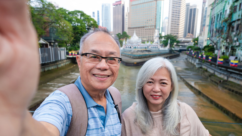 Retired couple traveling