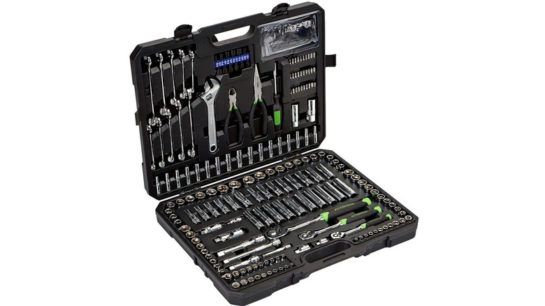 A mechanic's tool set in a black case with a white background