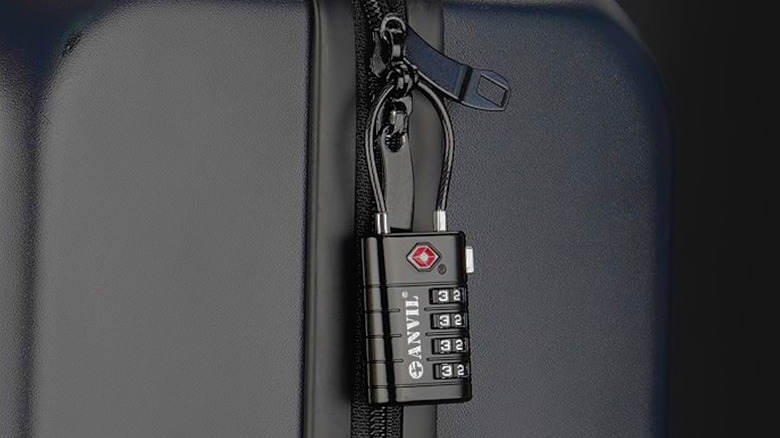 An Anvil TSA-Approved 4-Digit Combination Lock securing hard-shell luggage.