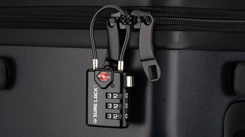 A SureLock TSA-Approved 3-Digit Combination Cable Lock securing a suitcase.